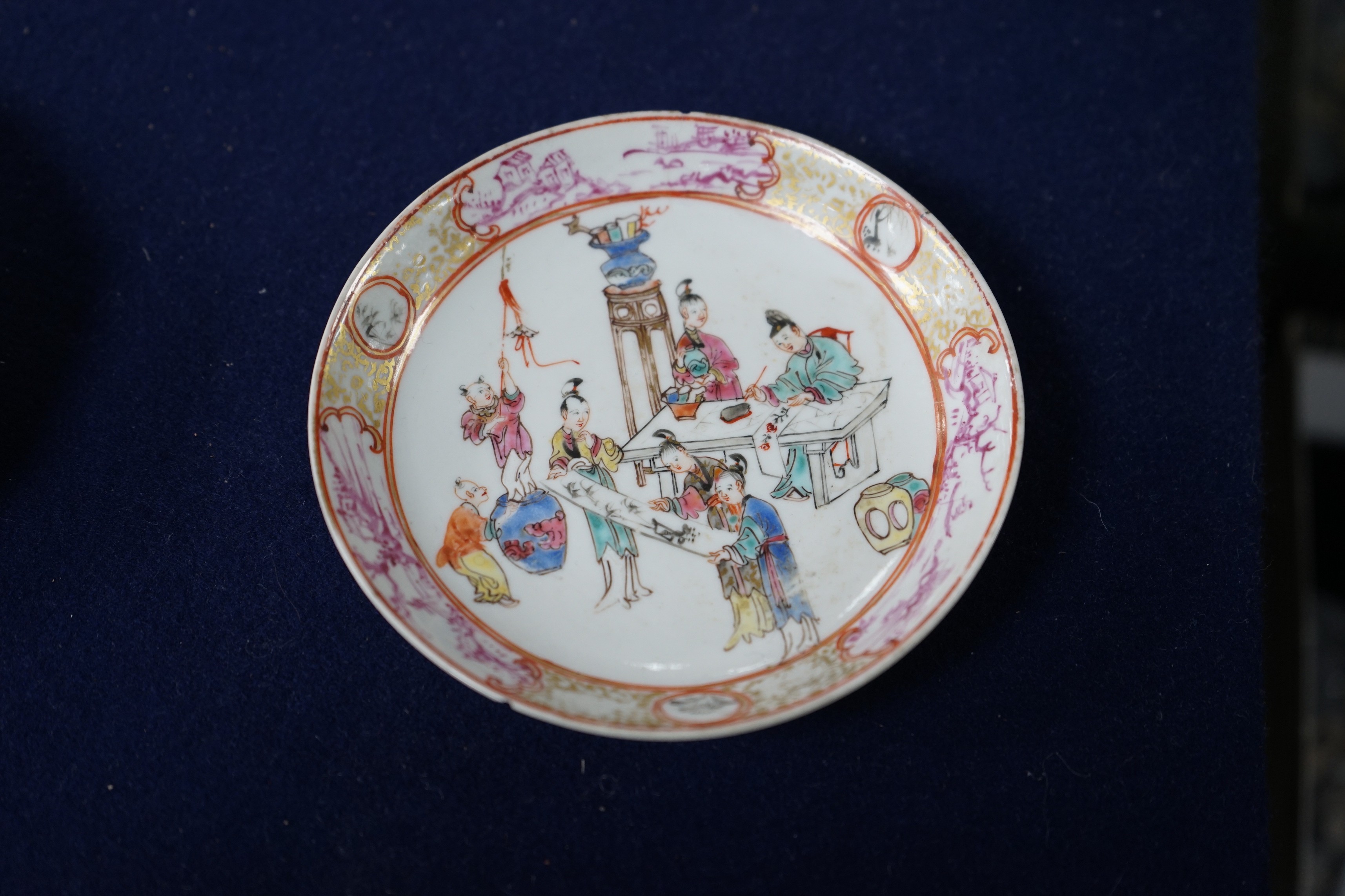 A group of four 18th century Chinese export famille rose saucers